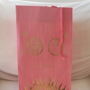 Gucci box and shopping bag